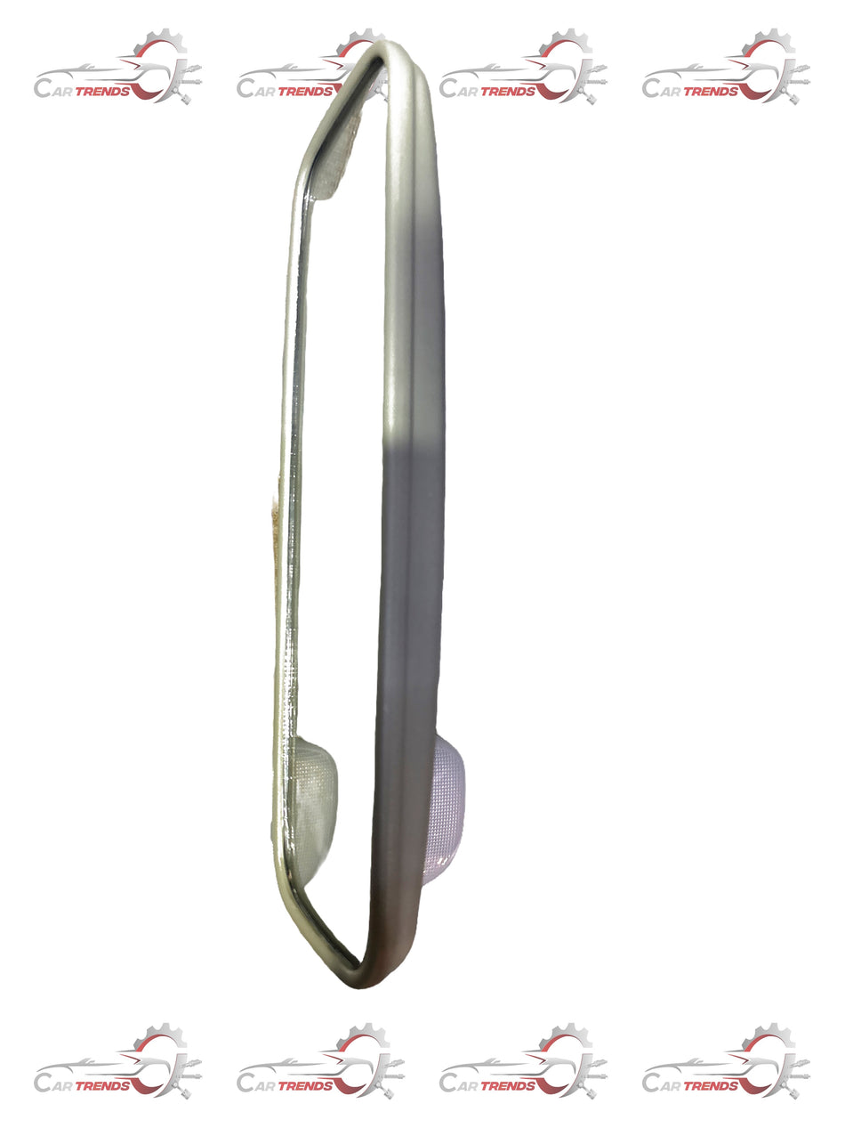 Maruti Suzuki gray inside rearview mirror assembly, showing the reflective mirror surface and mounting bracket.