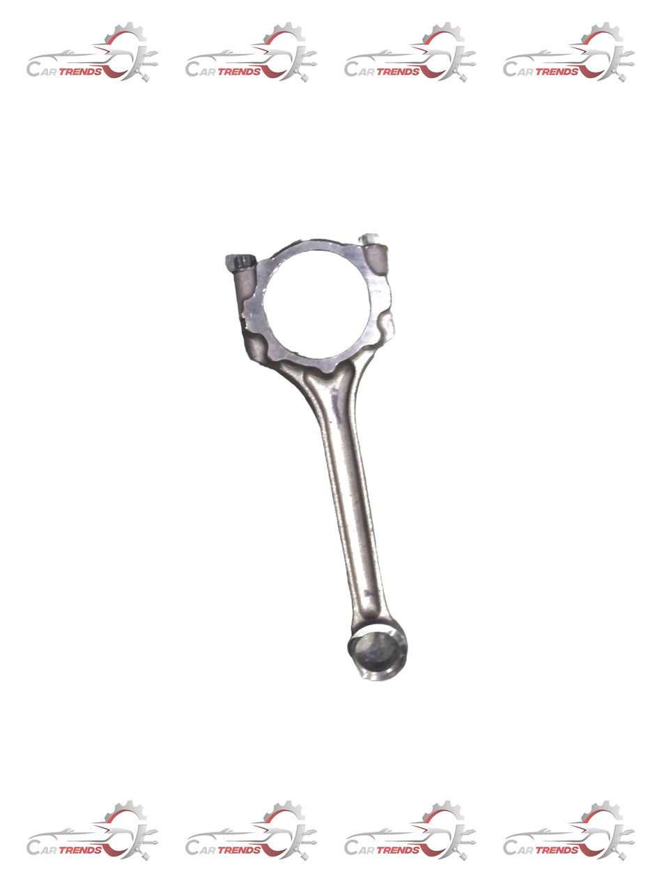 Maruti Suzuki Connrod Assy 12160M68PB0 showing a metal engine connecting rod component with visible parts and markings.