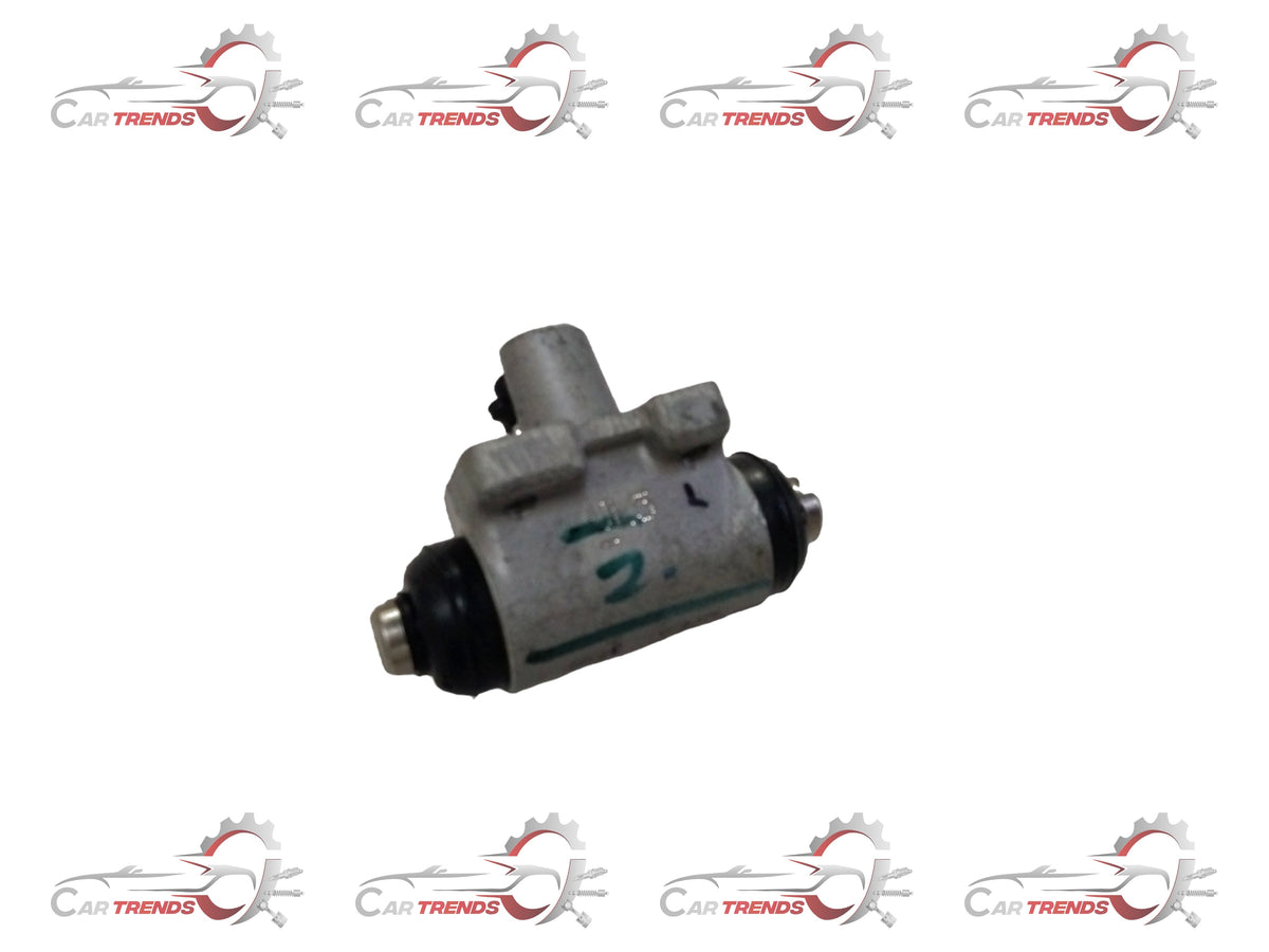 Maruti Suzuki rear brake cylinder assembly for left-hand side, with visible metal components and hydraulic connection.