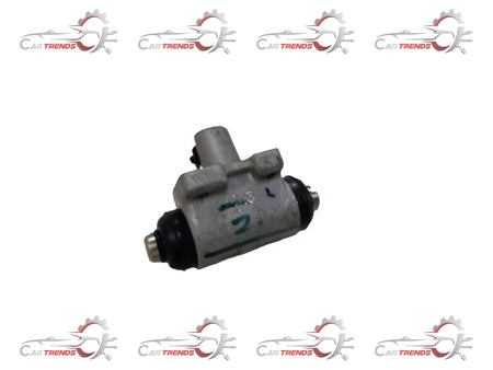 Maruti Suzuki rear brake cylinder assembly for left-hand side, with visible metal components and hydraulic connection.
