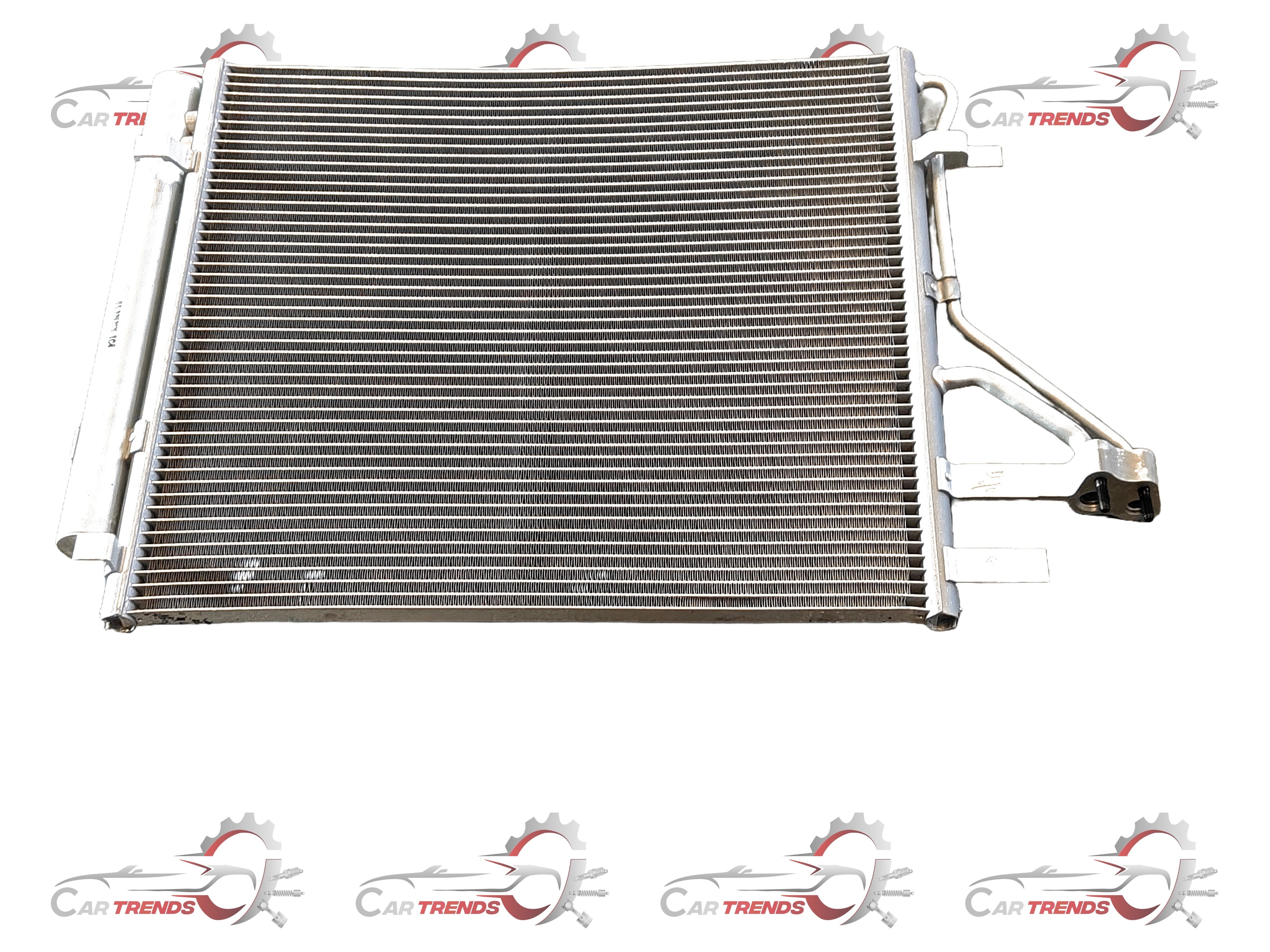 Hyundai CarTrends Condenser Air Aura 97606K6000 showing the automotive condenser component with metal fins and mounting points
