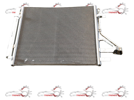 Hyundai CarTrends Condenser Air Aura 97606K6000 showing the automotive condenser component with metal fins and mounting points