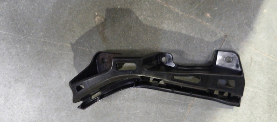 Maruti Suzuki bumper holder front right part 71733M55R00, shown in a detailed close-up, designed for vehicle safety and support.