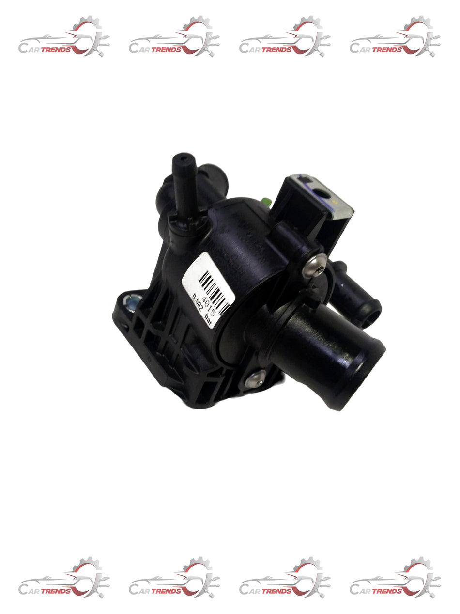 Maruti Suzuki thermostat housing Baleno type 1, metal engine component with mounting points and cooling passage openings.
