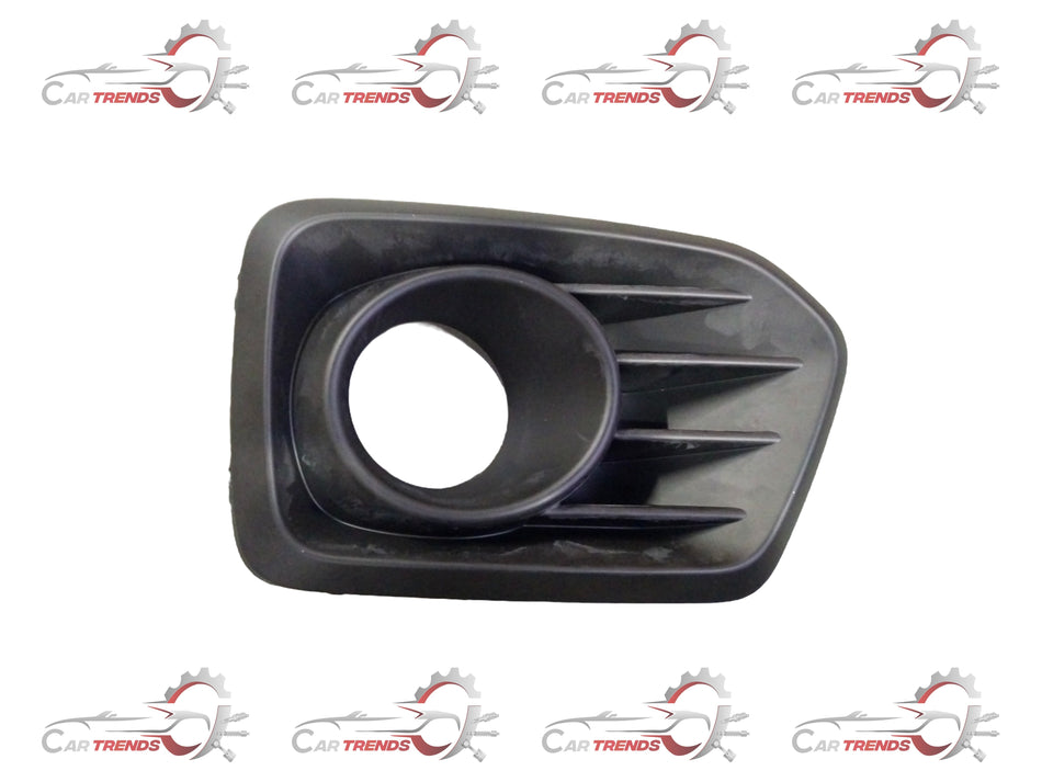 Maruti Suzuki fog lamp bezel front 71751M85S205PK, black plastic with mounting clips, designed for Maruti Suzuki vehicle lighting.