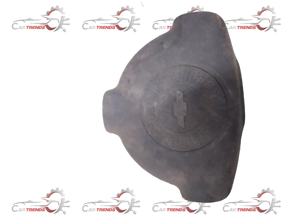 General Motors CAP A HORN Optra Petrol J96399750, vehicle horn cap showing the black plastic cover with GM branding