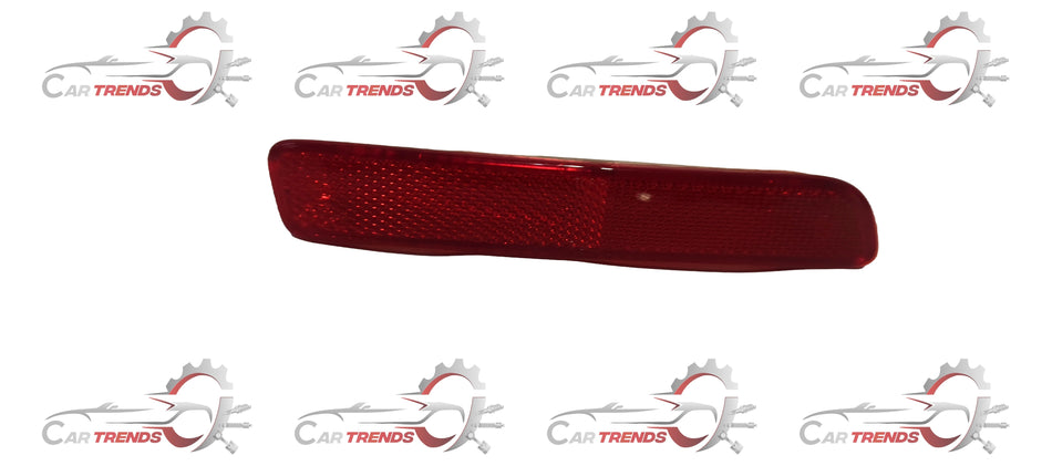 Left side reflector assembly for Maruti Baleno by CarTrends, shown in a close-up photo highlighting the reflective surface.