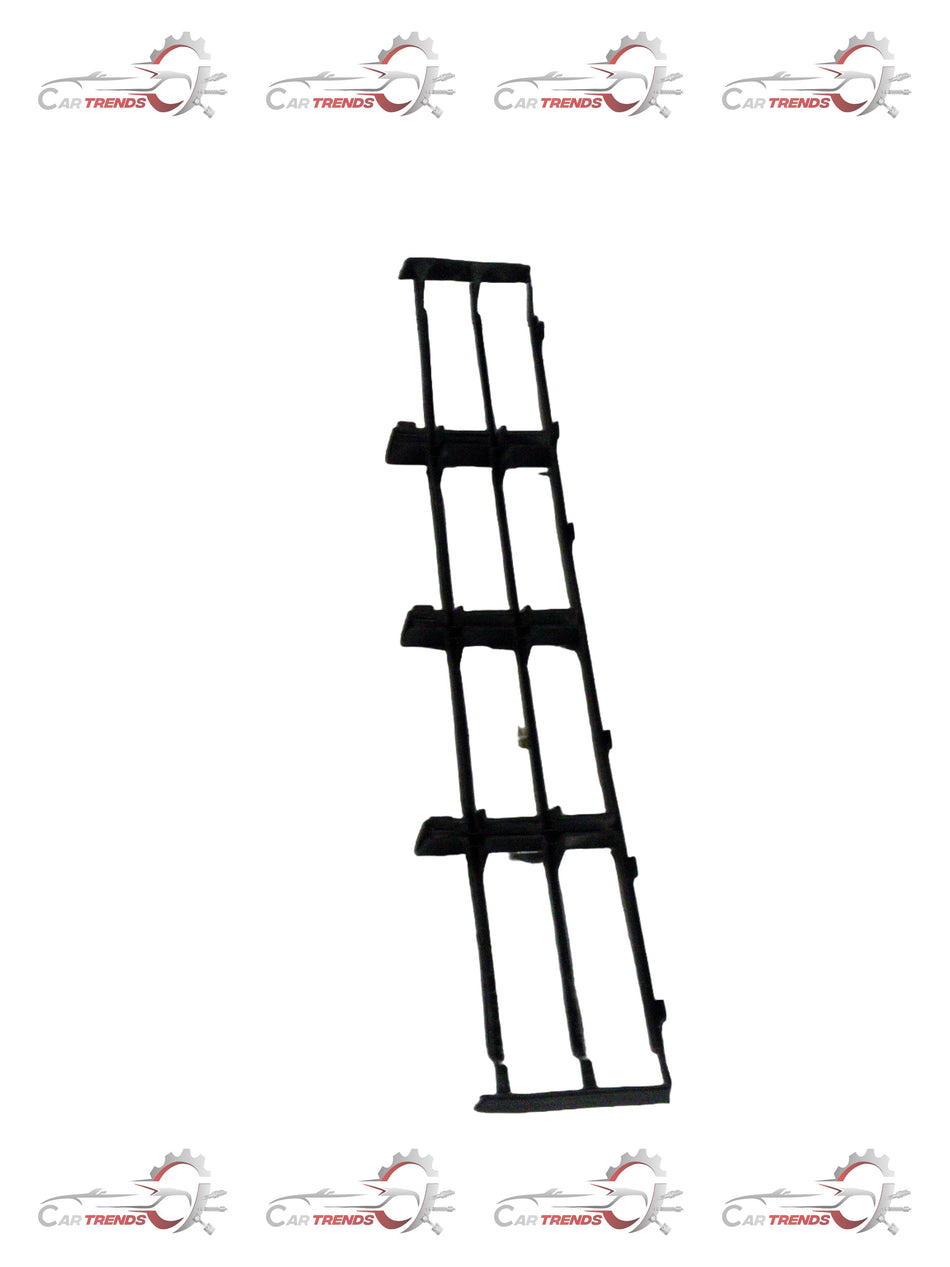 Volkswagen Fabia lower grille in black plastic, showing the front exterior component with mounting points
