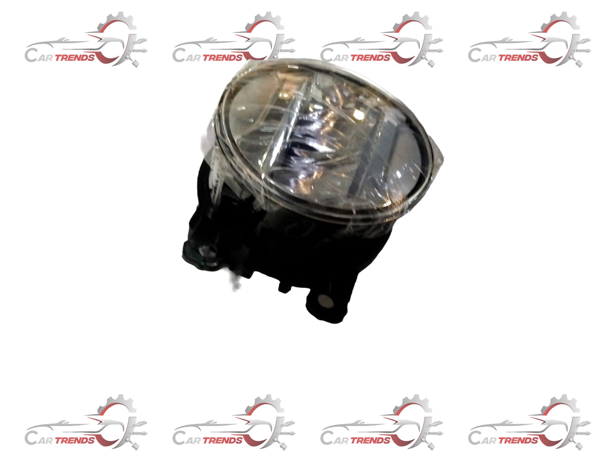 Maruti Suzuki fog lamp assembly with clear lens and black housing, designed for vehicle lighting and safety.