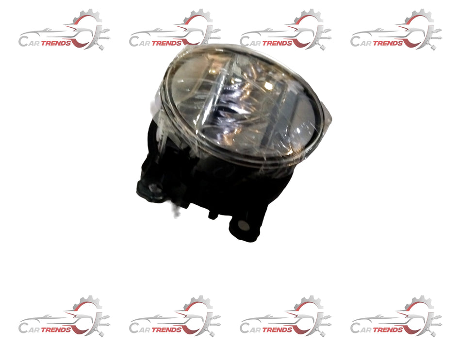 Maruti Suzuki fog lamp assembly with clear lens and black housing, designed for vehicle lighting and safety.