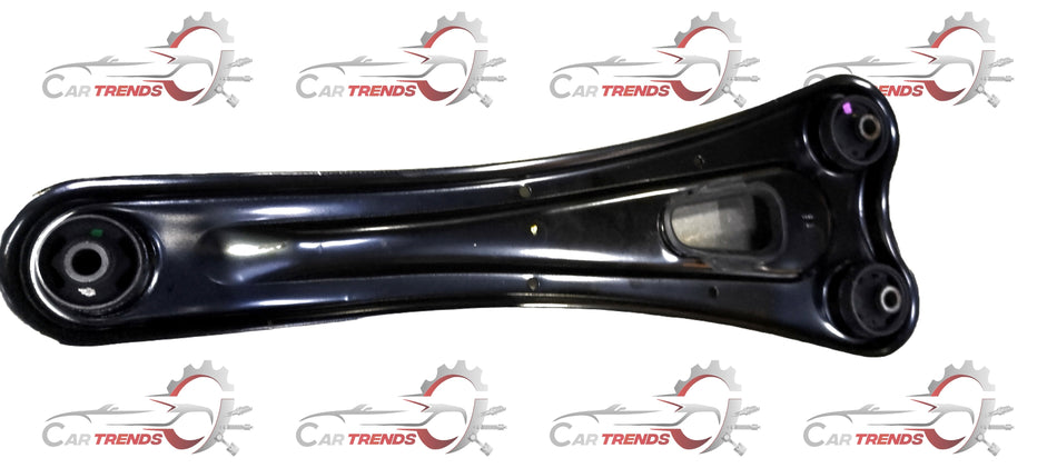 Maruti Suzuki rear trailing arm assembly 46200M78L00 showing metal suspension component with mounting points