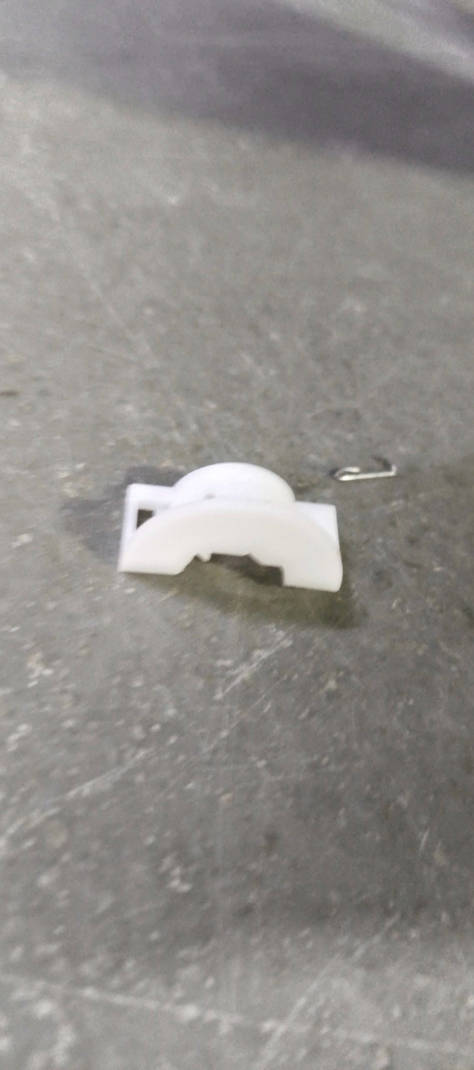 Honda Amaze attaching piece part 36751T2AA01, metal component with bolt and mounting points visible.