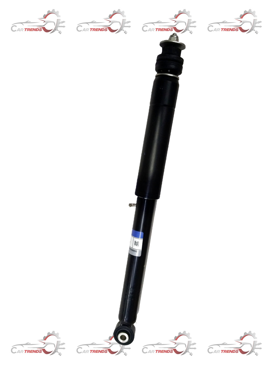 Maruti Suzuki absorber assembly rear shock absorber for vehicle suspension, featuring black metal components and mounting points.