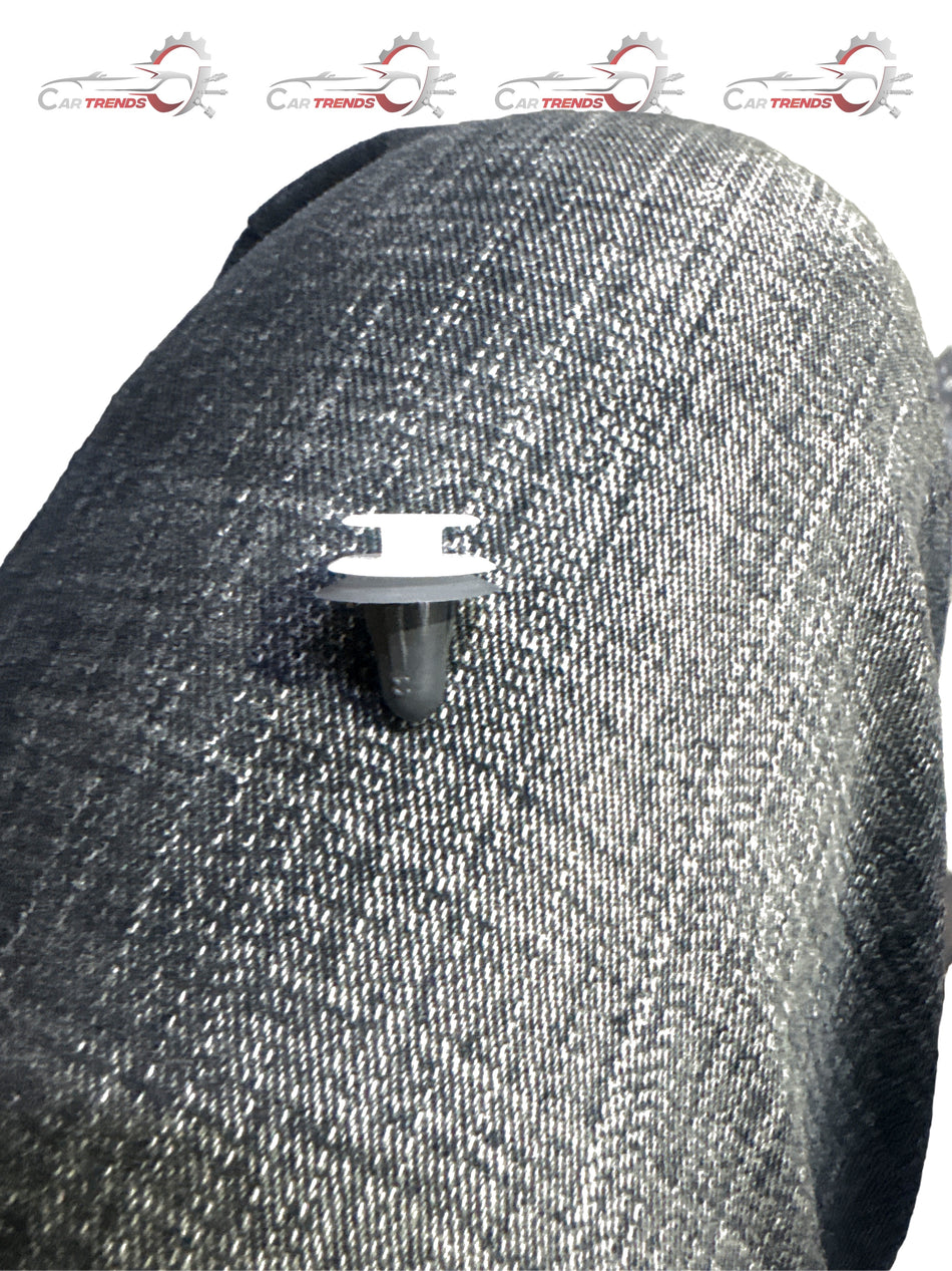 Maruti Suzuki clip door trim part 09409M08L06 shown in a close-up photo, highlighting its shape and mounting points.