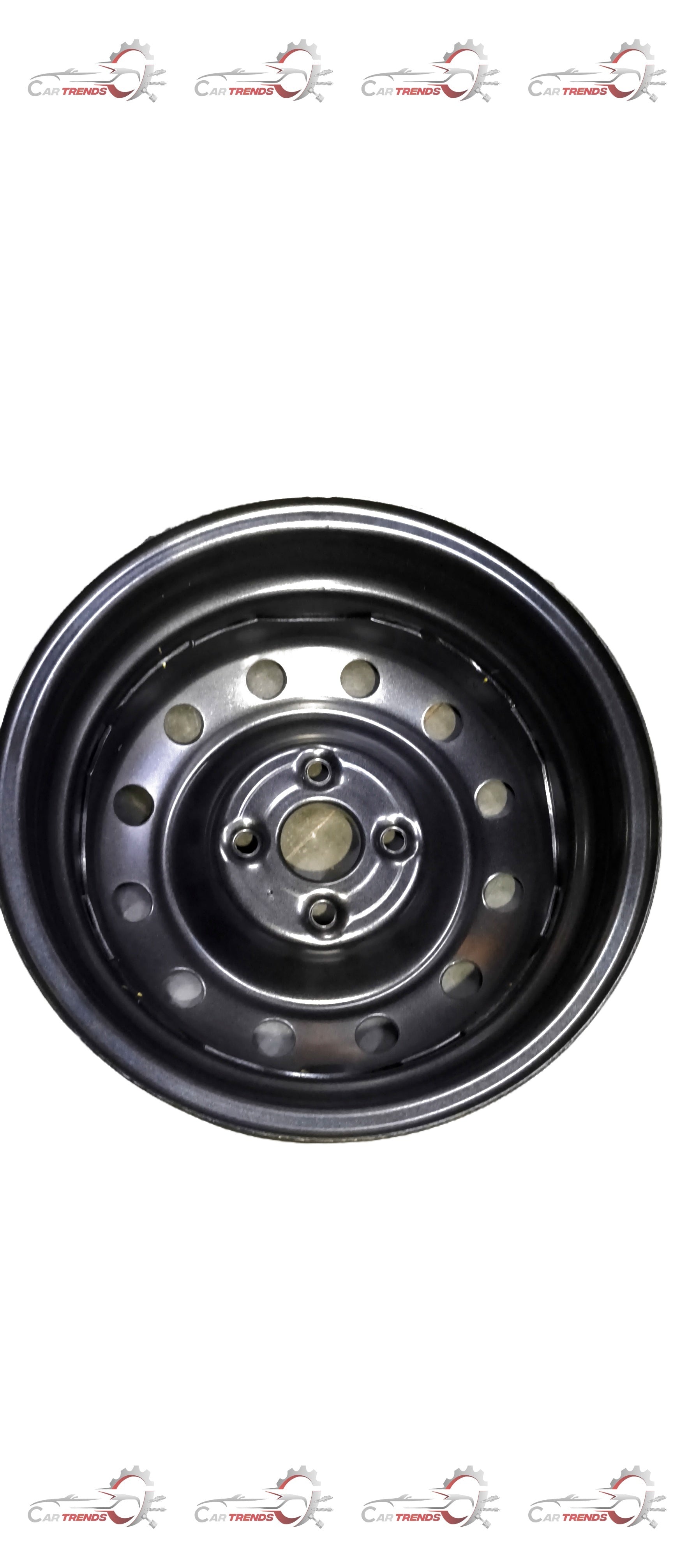 Maruti Suzuki Wheel Comp 43210M55R0139M showing a close-up of the vehicle's wheel with a metallic finish and detailed tire treads.