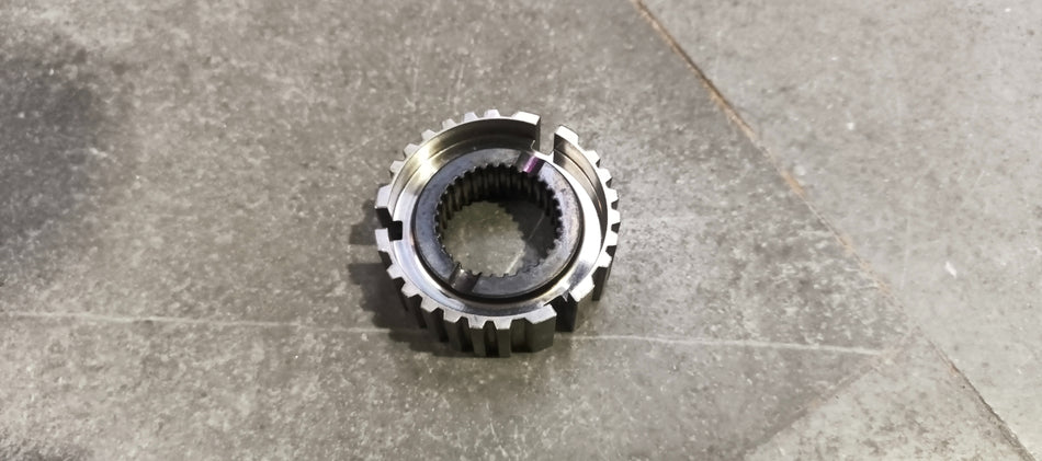 Maruti Suzuki Hublow Speed Sync 24411M67K00 automotive part, showing the branded component with detailed metallic and plastic features.