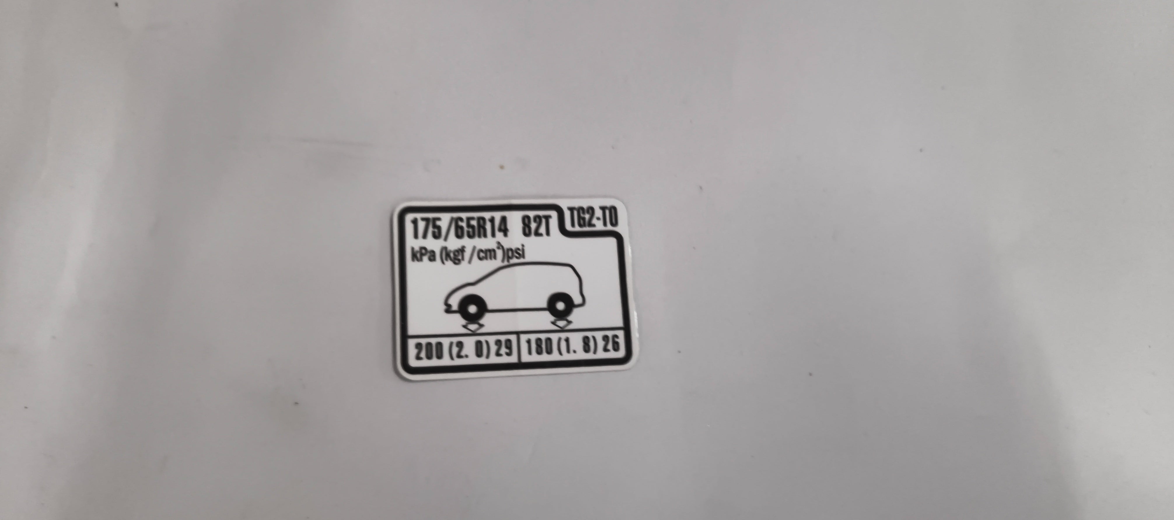 HONDA CAUTION PLATE.(TIRE PRESSURE) 42760TG2T00 42760TG2T00 - Front view