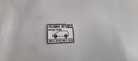 HONDA CAUTION PLATE.(TIRE PRESSURE) 42760TG2T00 42760TG2T00 - Front view