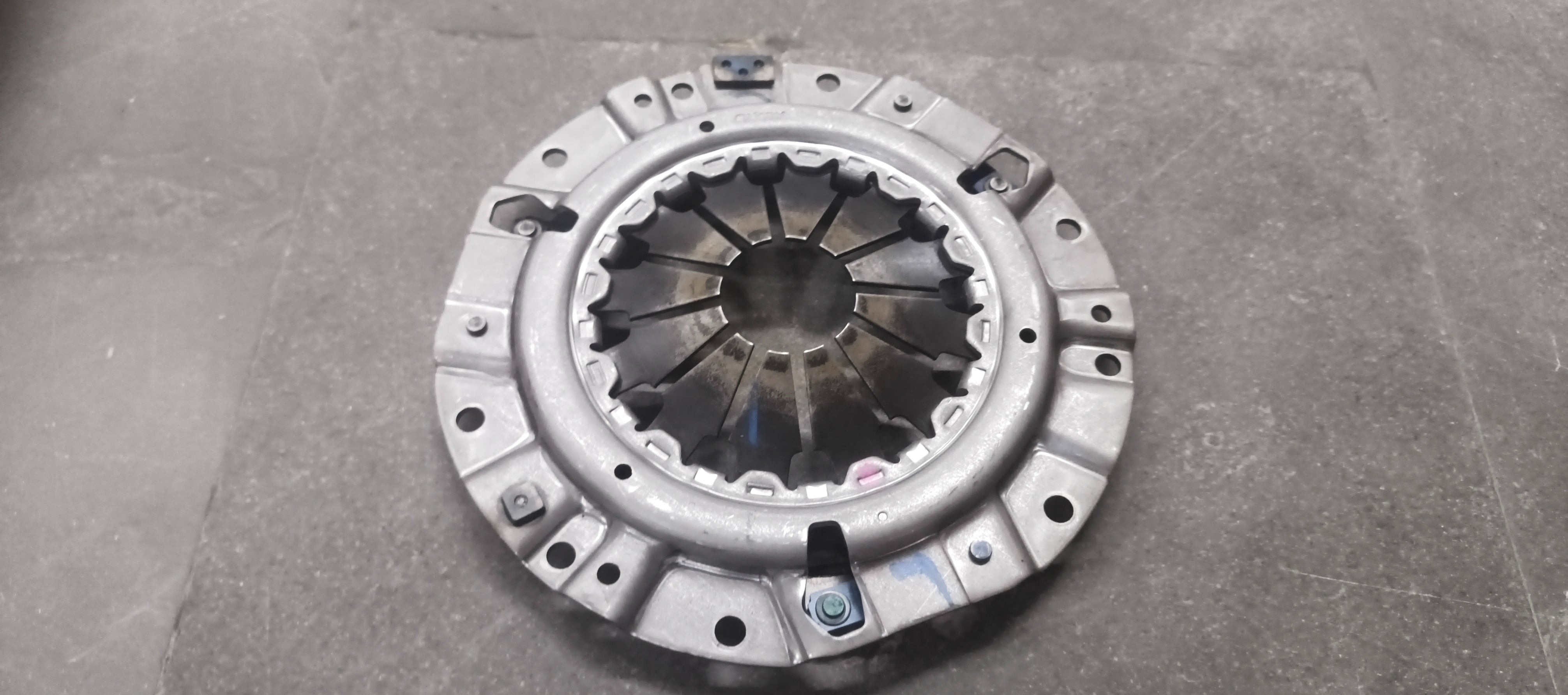 CarTrends pressure plate for Swift Dzire, spare part image showing the mechanical component with metal surface and mounting points.