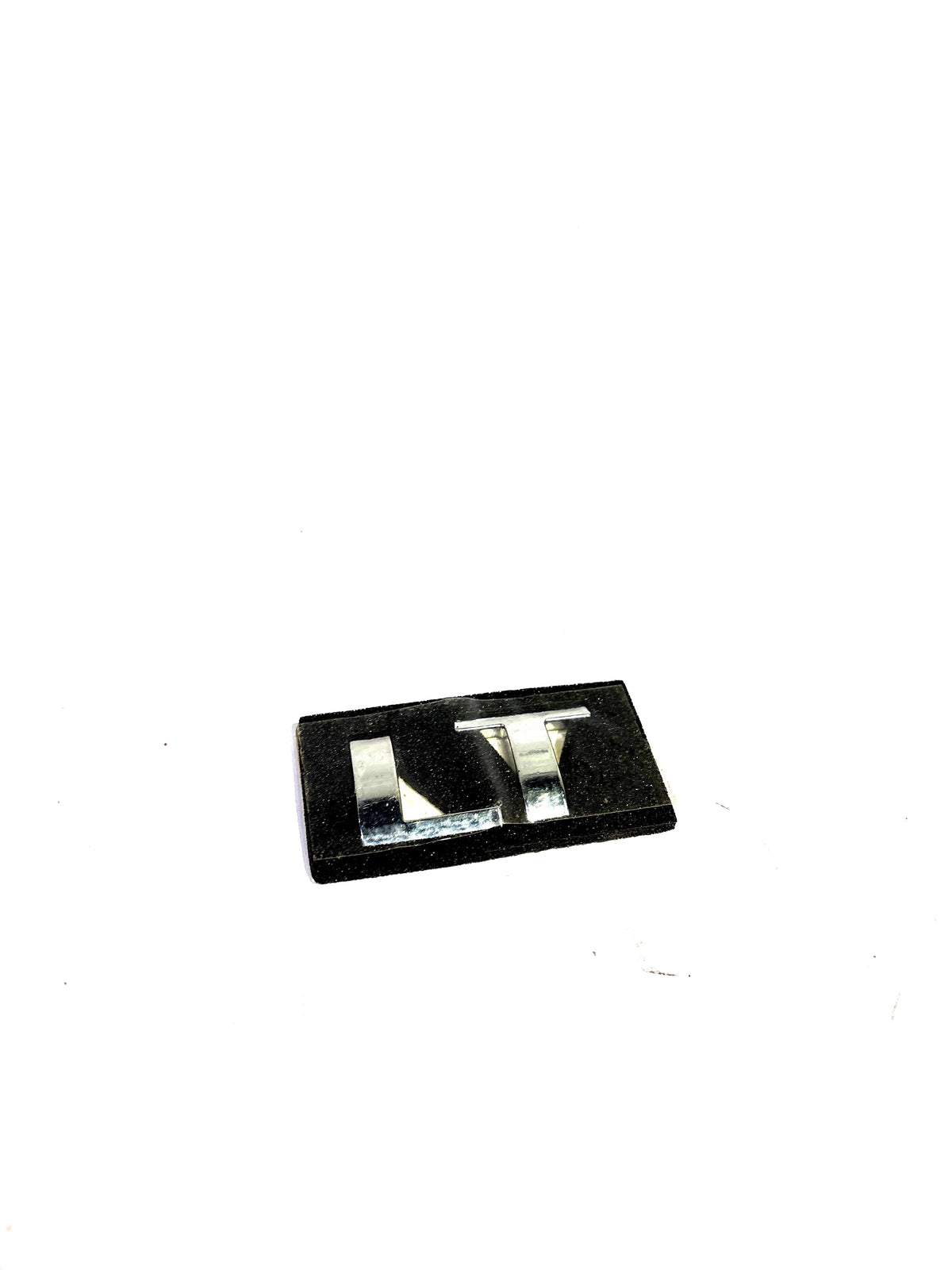 GENERAL MOTORS NAME PLATE LT TAVERA T97595824 T97595824 - Front view