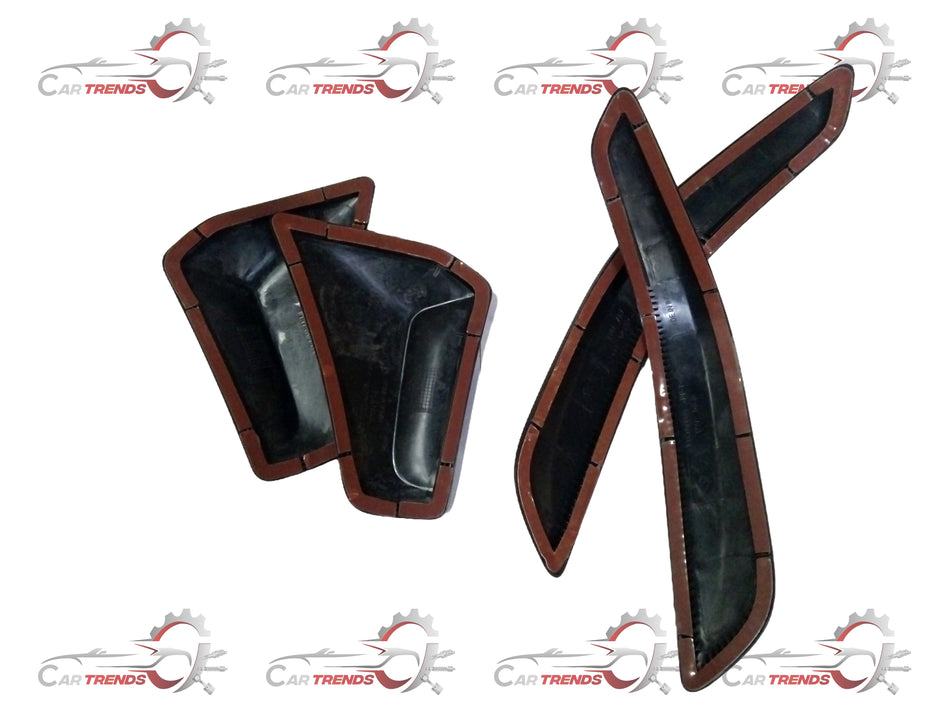 Honda KIT FR & RR bumper protector, durable black plastic with textured surface, designed to shield front and rear bumpers.