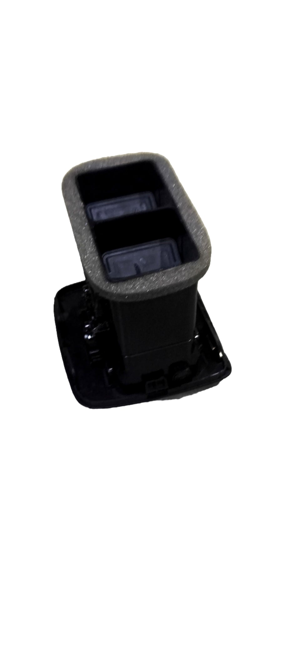 Maruti Suzuki louver rear vent part with black louvered grille and mounting bracket for vehicle ventilation.