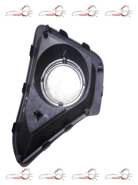 Hyundai Grand I10 fog lamp cover open left side, black plastic car part with mounting details