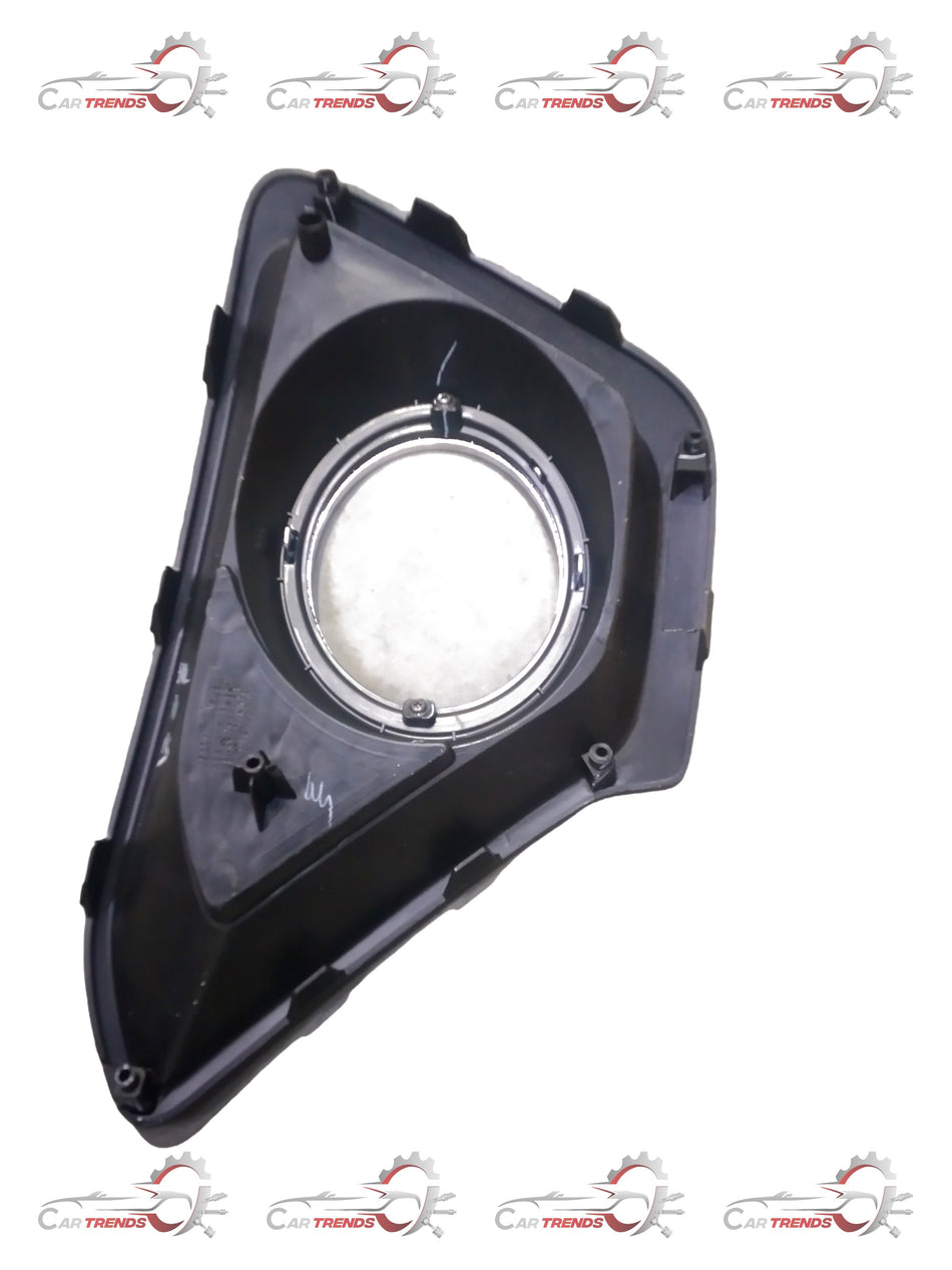 Hyundai Grand I10 fog lamp cover open left side, black plastic car part with mounting details