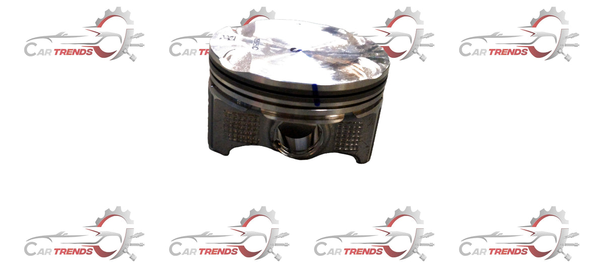 Maruti Suzuki piston 12111M54T00 shown in a clear close-up image, highlighting its metallic surface and detailed construction.