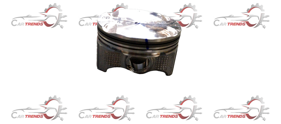 Maruti Suzuki piston 12111M54T00 shown in a clear close-up image, highlighting its metallic surface and detailed construction.