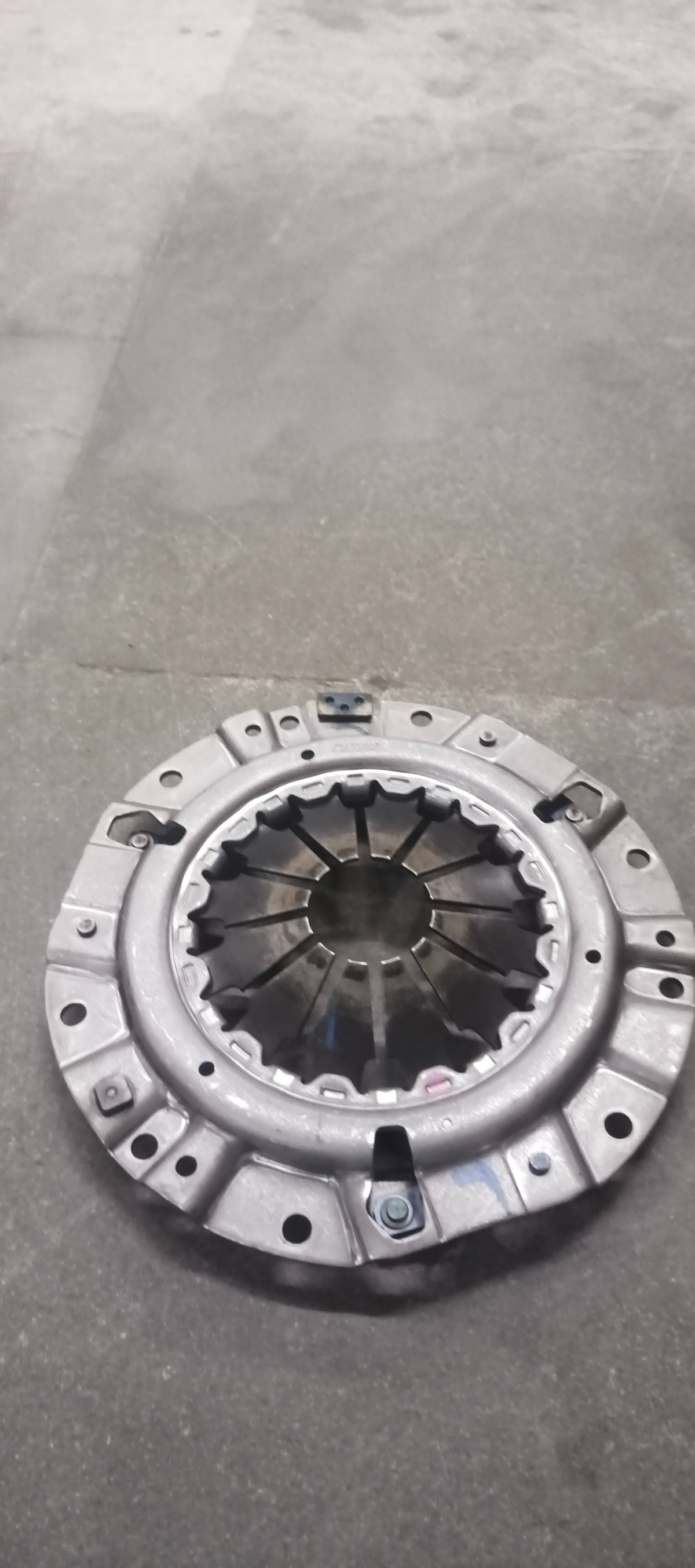 CarTrends pressure plate for Swift Dzire, spare part image showing the metal pressure plate with mounting holes and clutch component details.