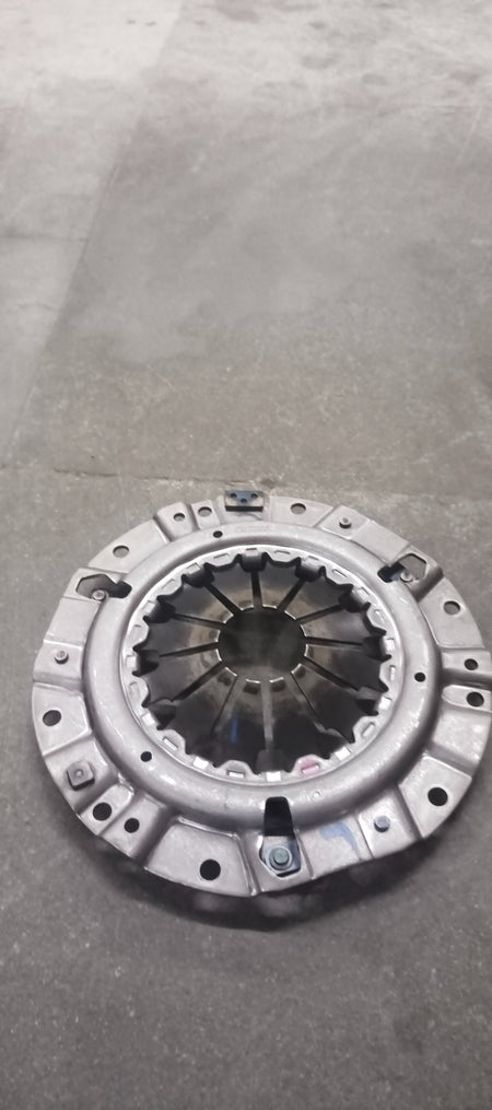 CarTrends pressure plate for Swift Dzire, spare part image showing the metal pressure plate with mounting holes and clutch component details.