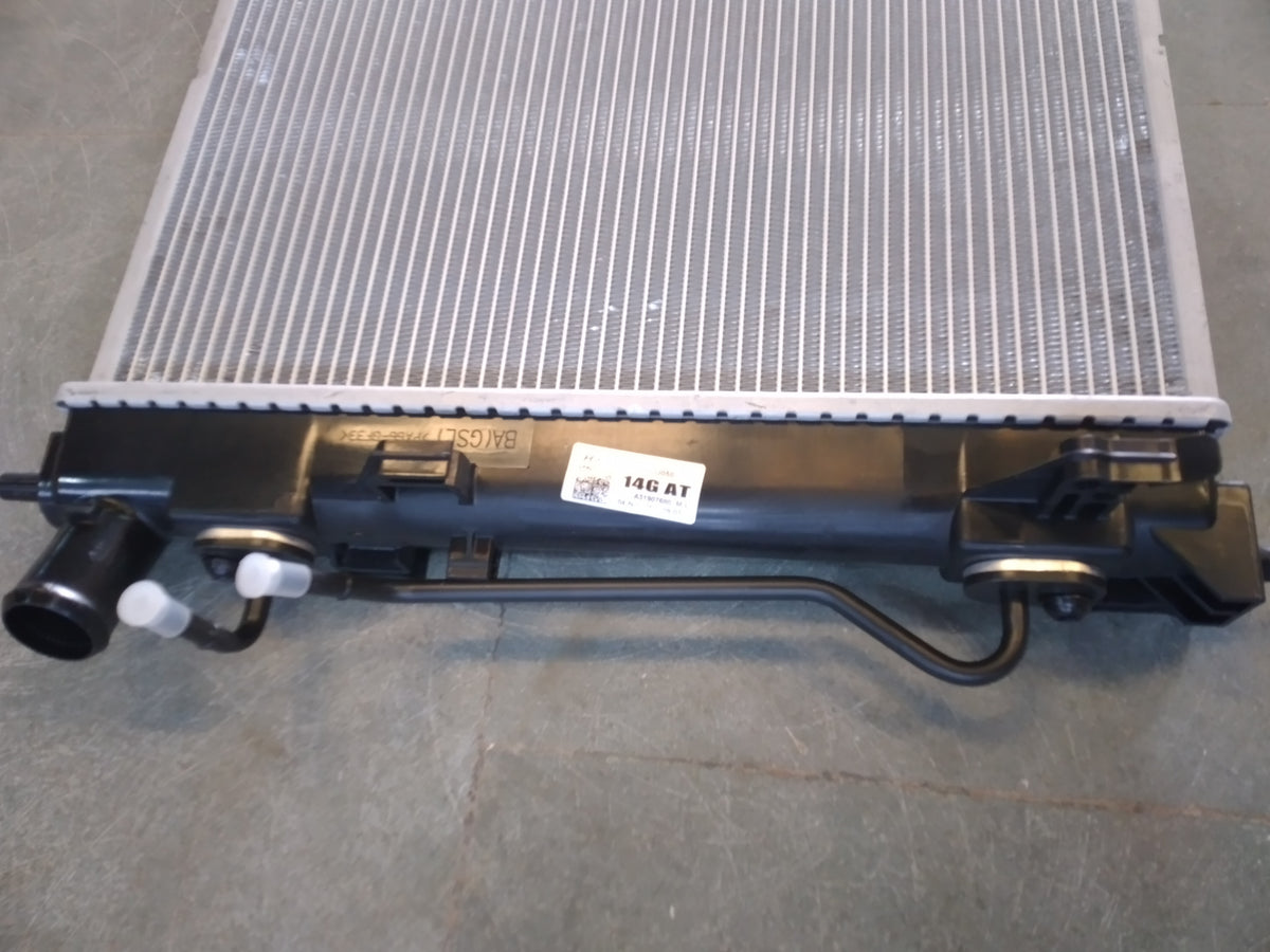 Hyundai 253100u050 radiator for petrol Xcent, new model, showing the metal core and mounting brackets in the image.
