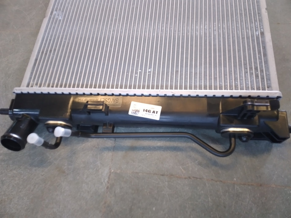 Hyundai 253100u050 radiator for petrol Xcent, new model, showing the metal core and mounting brackets in the image.