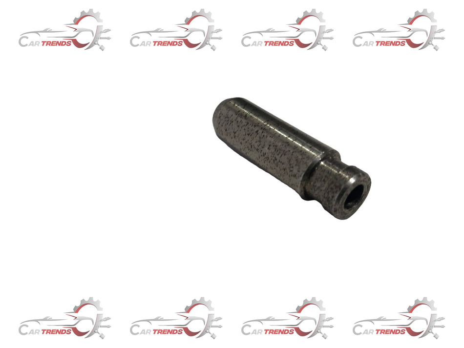 Maruti Suzuki Guide Valve 11115M74L10001, automotive engine component in a close-up view, showing metal parts and fittings.