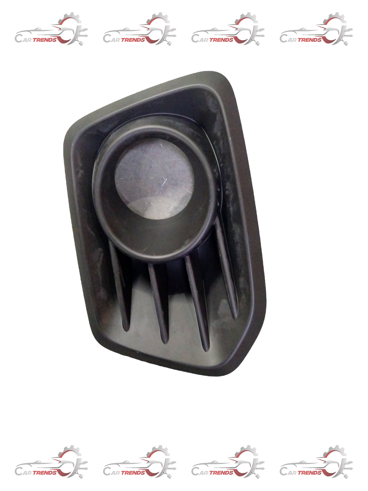 Maruti Suzuki fog lamp bezel front part with clear lens for vehicle lighting, shown in a close-up image.