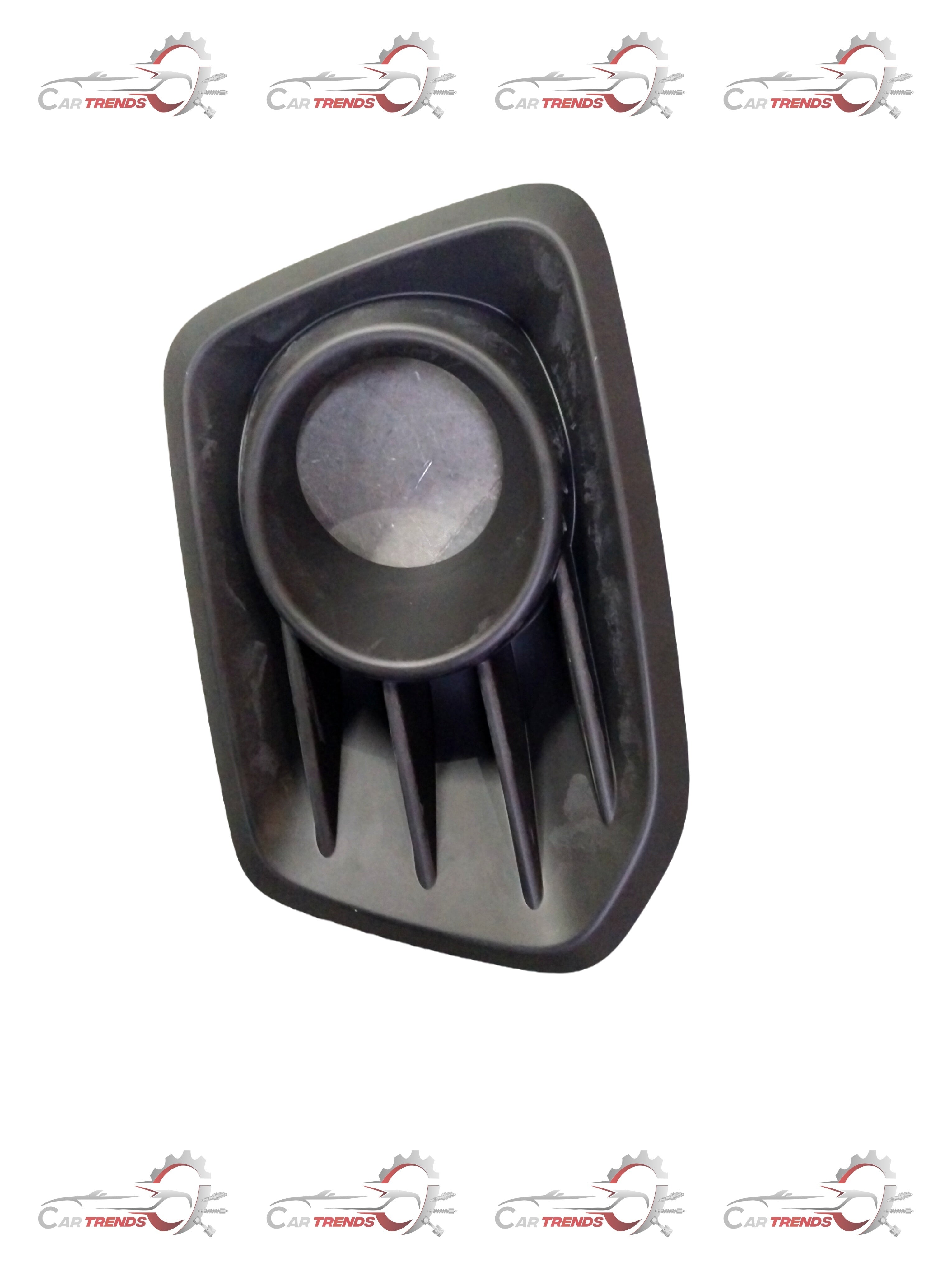 Maruti Suzuki fog lamp bezel front part with clear lens for vehicle lighting, shown in a close-up image.