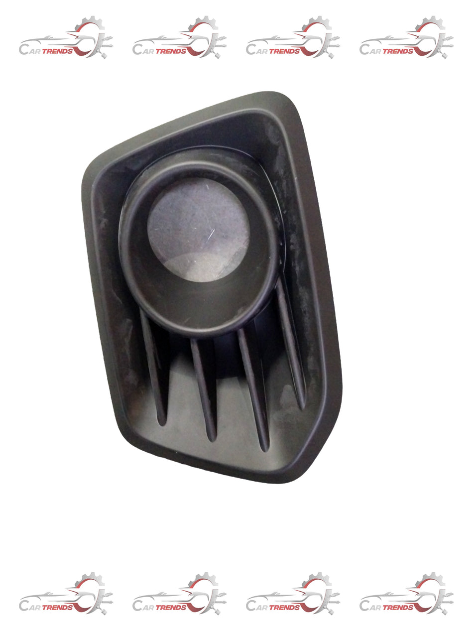 Maruti Suzuki fog lamp bezel front part with clear lens for vehicle lighting, shown in a close-up image.