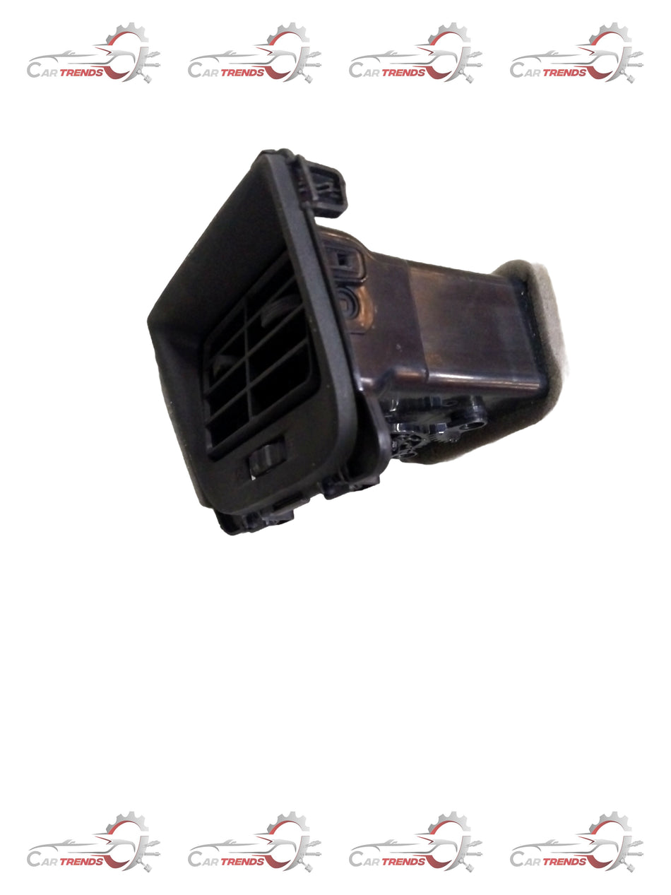 Maruti Suzuki louver rear vent part, black plastic with slatted design, shown in a close-up photo.