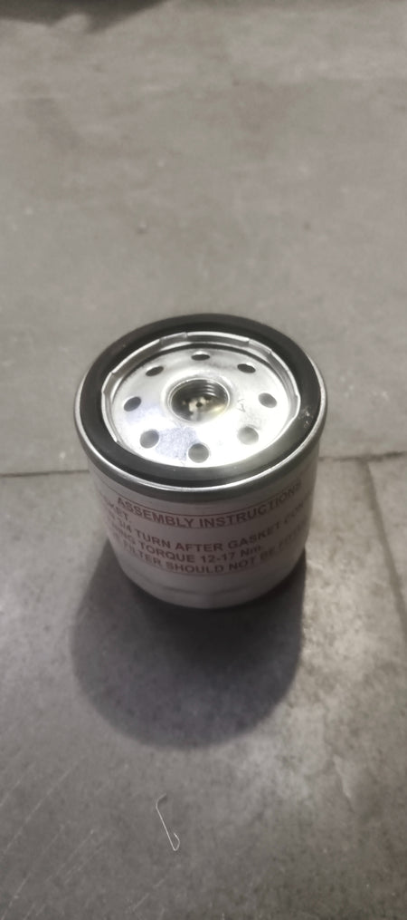 Ford EcoSport oil filter model 7S7Z6731E, automotive engine oil filter with black rubber seals and metal body.