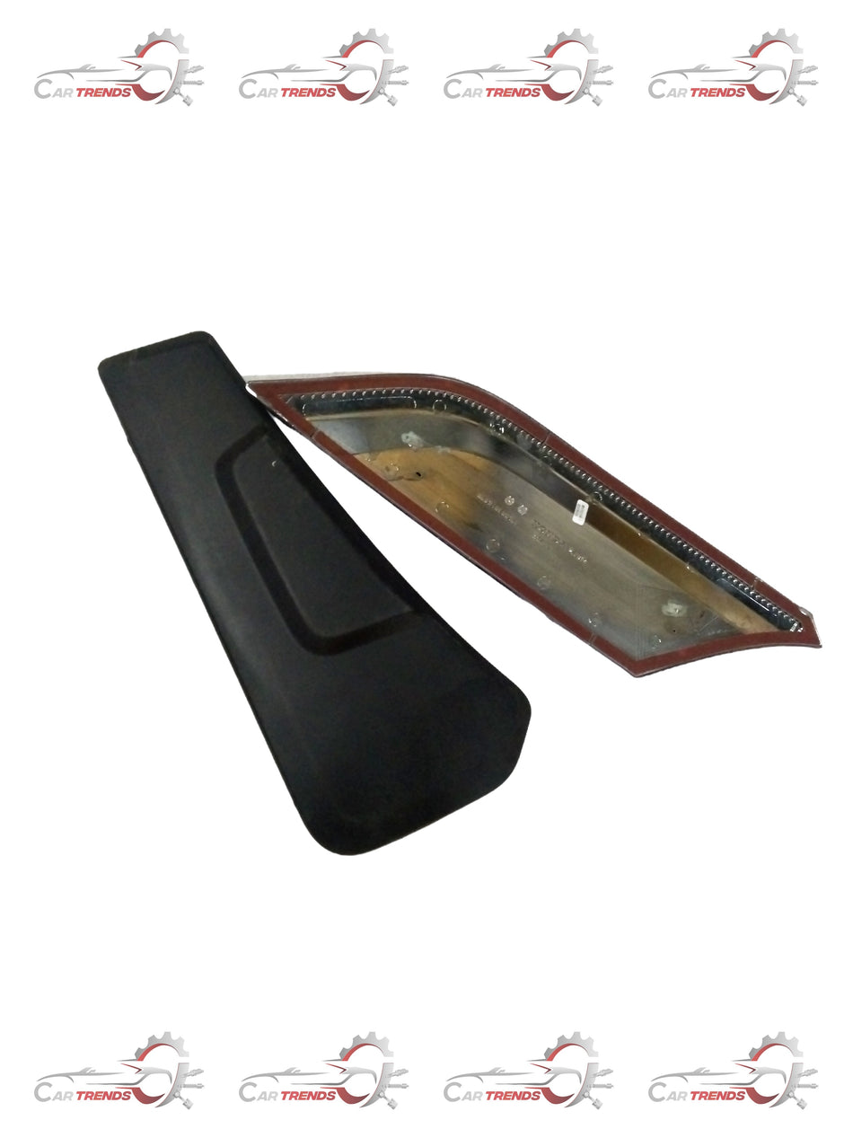Honda quarter pillar garnish kit, showing sleek chrome trim with mounting clips for a Honda vehicle.