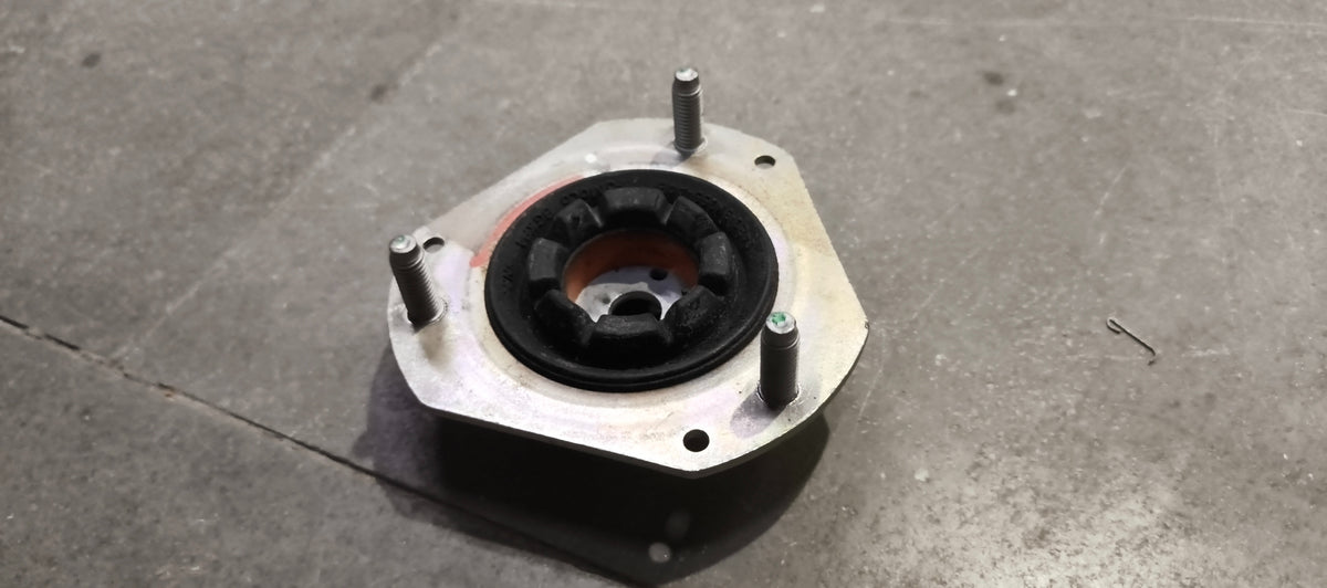 Ford mounting assembly E4BZ3A197A, automotive engine part with metal brackets and mounting points, for Ford vehicles.