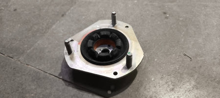 Ford mounting assembly E4BZ3A197A, automotive engine part with metal brackets and mounting points, for Ford vehicles.