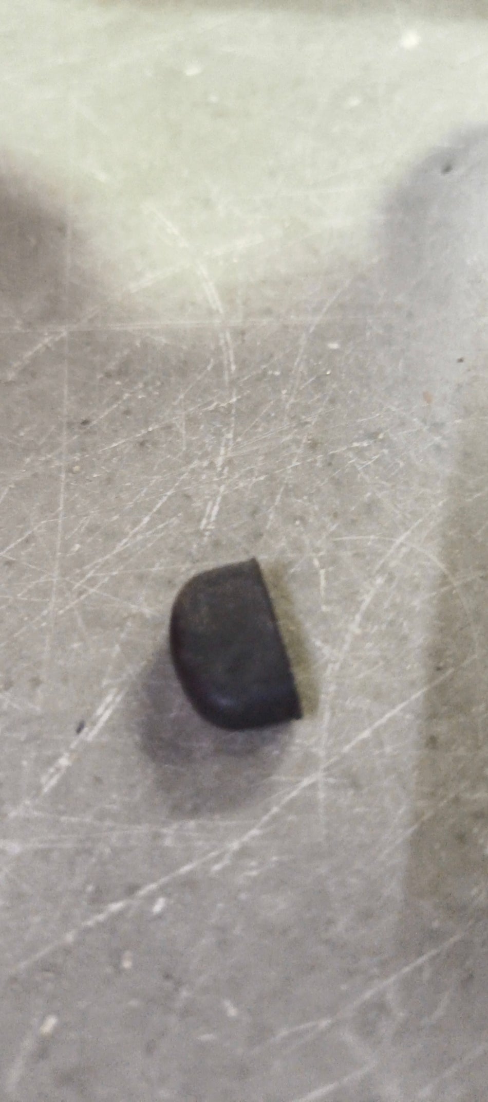 Maruti Suzuki CushionFuel lid 77116M74L00, automotive fuel tank cap for Maruti Suzuki vehicles, shown in the image.