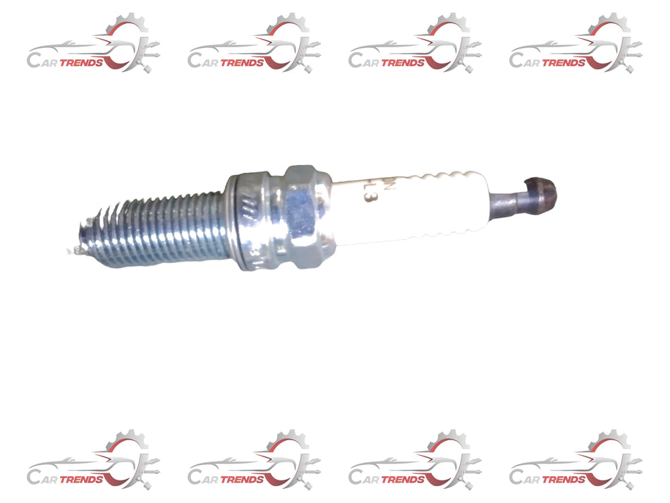 Hyundai SPARK PLUG EON for Hyundai vehicles, close-up view showing the metal and ceramic components of the spark plug.