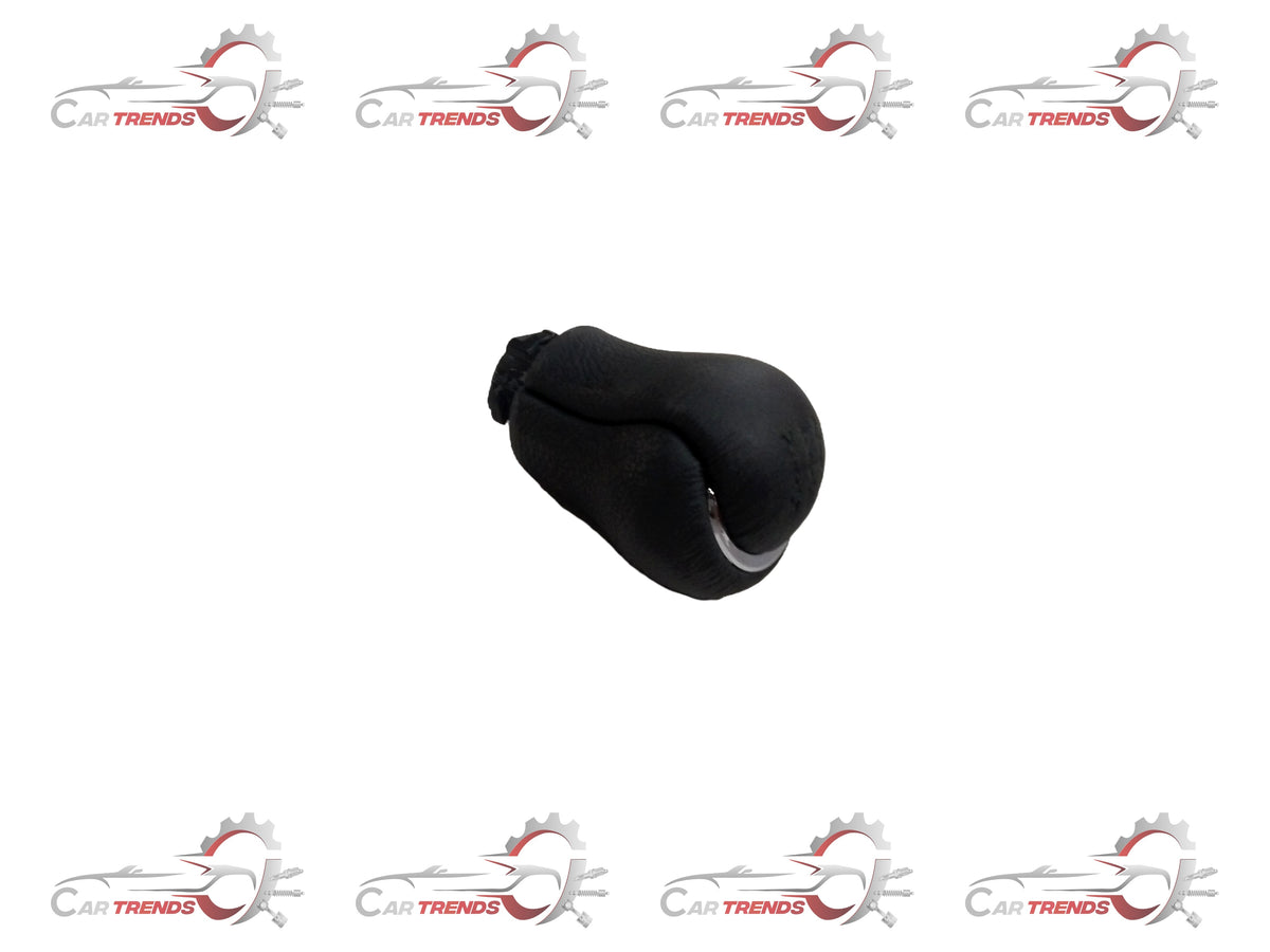 Toyota shift knob lever 335040K200C0, close-up image showing black plastic handle with gear shift pattern.