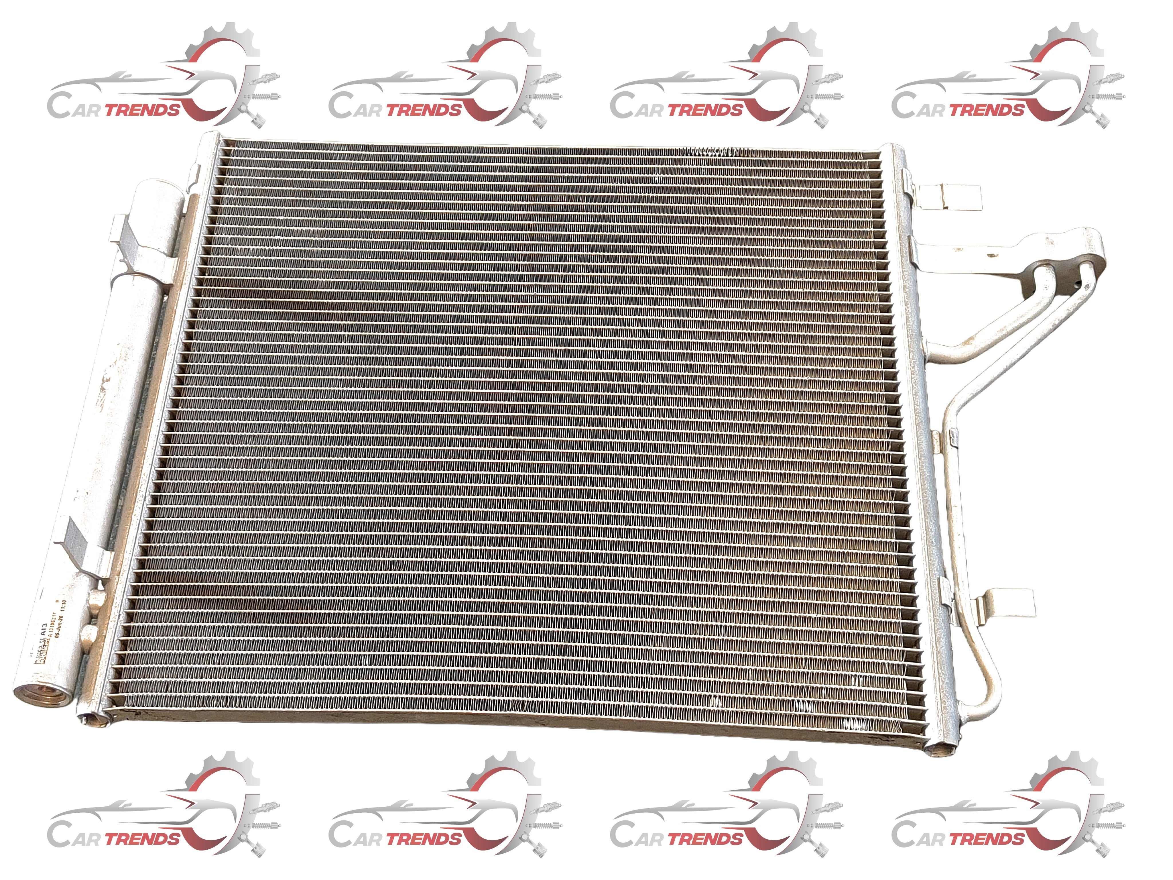 Hyundai CarTrends Condenser Air Aura 97606K6000 for vehicle cooling system, showing the detailed condenser component.