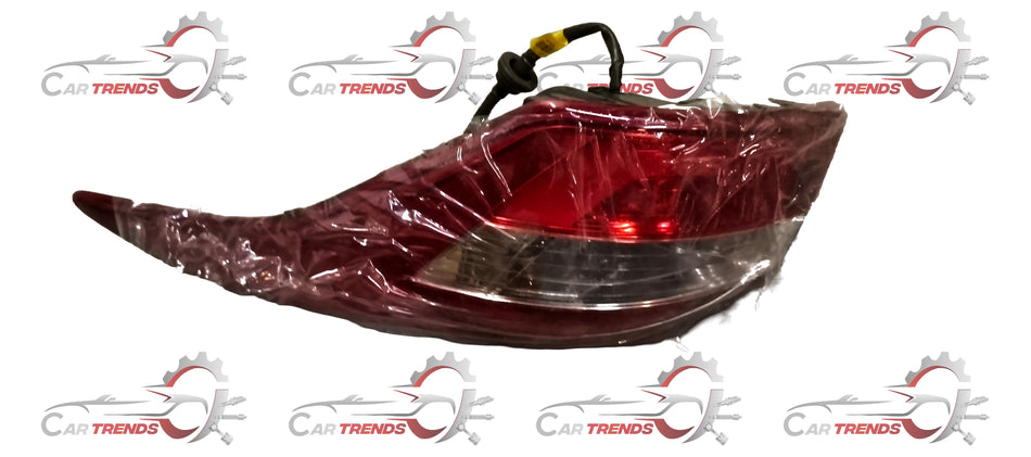 Hyundai Creta tail lamp with red and clear lens, featuring sleek design and LED light elements, mounted on the vehicle's rear.