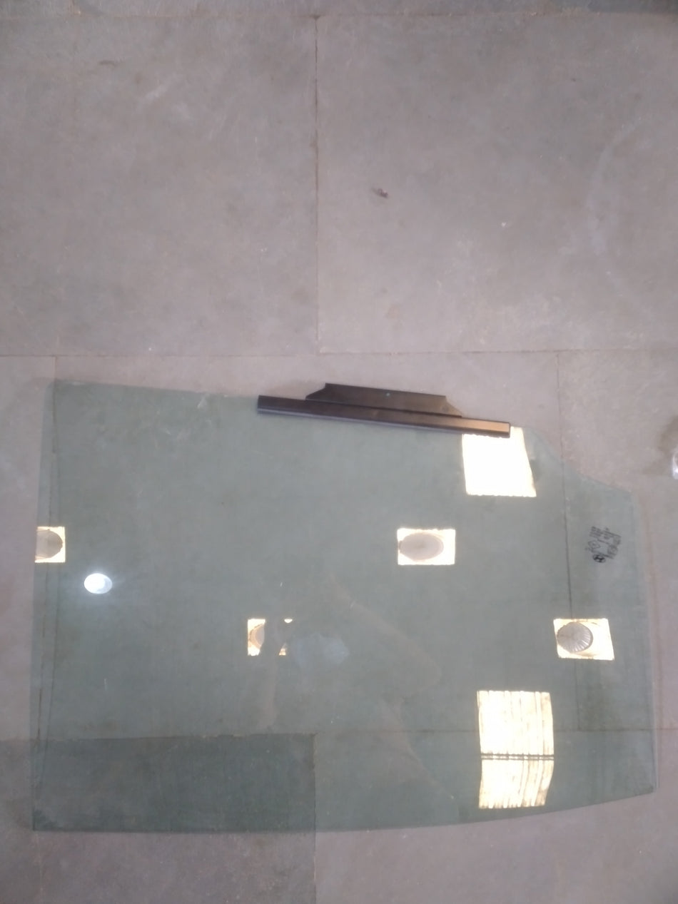 Hyundai rear right door glass assembly showing the transparent glass panel and door frame with mounting edges.