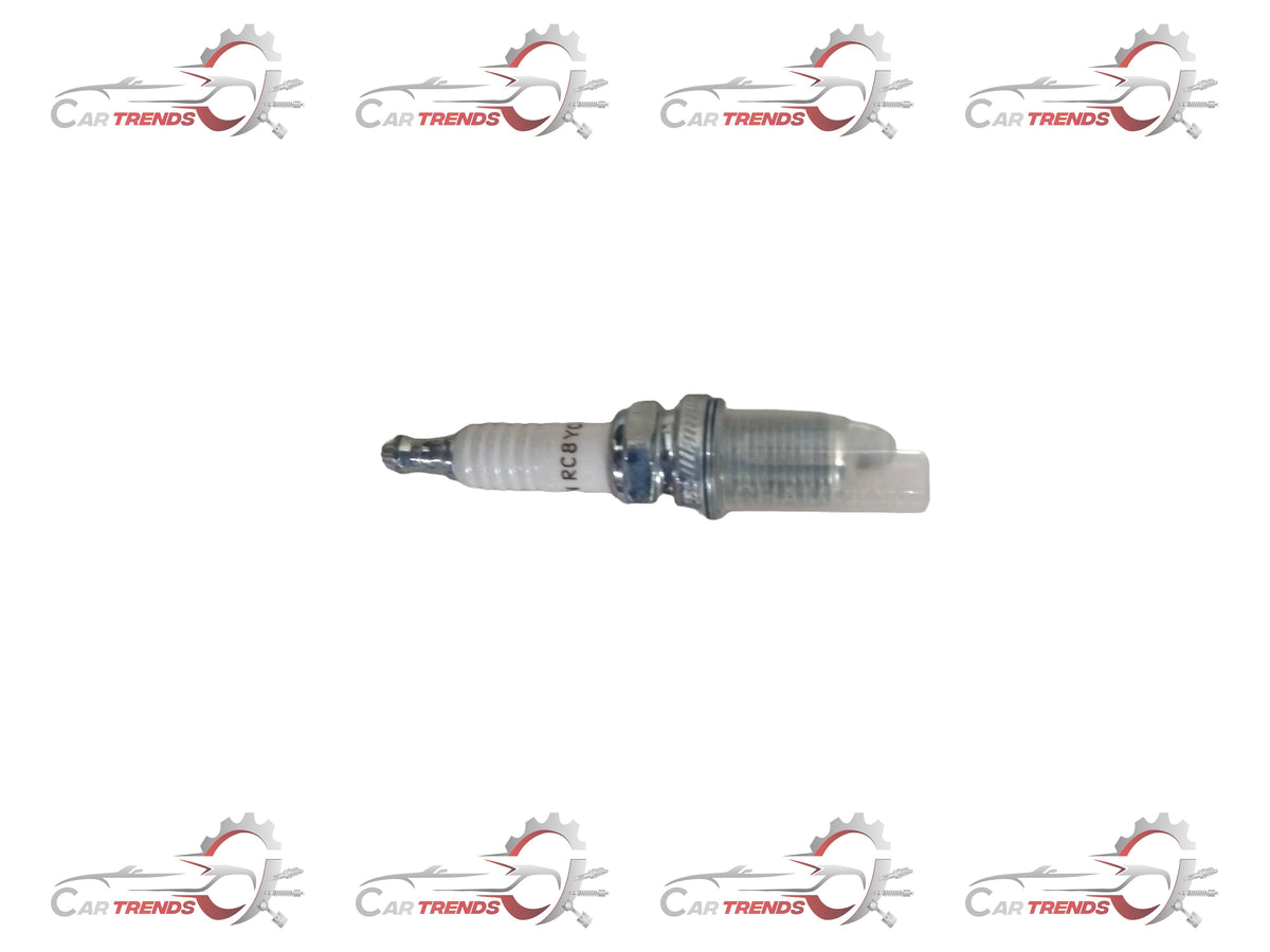 Maruti Suzuki Spark Plug BKR6E Zenesteem & Gypsy model, showing the metal tip and ceramic insulator of the ignition component.